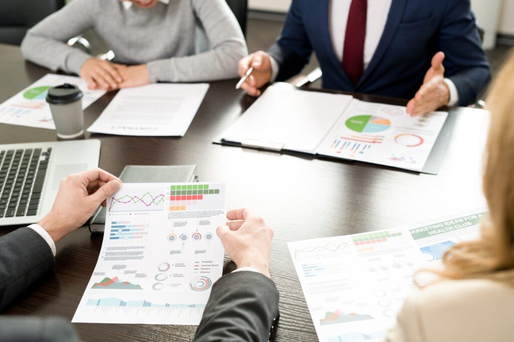 Business team reviewing financial charts and reports