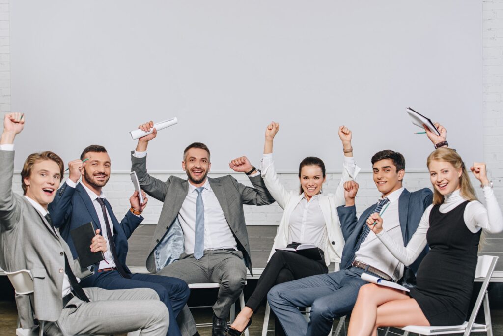 Business team celebrating success in office