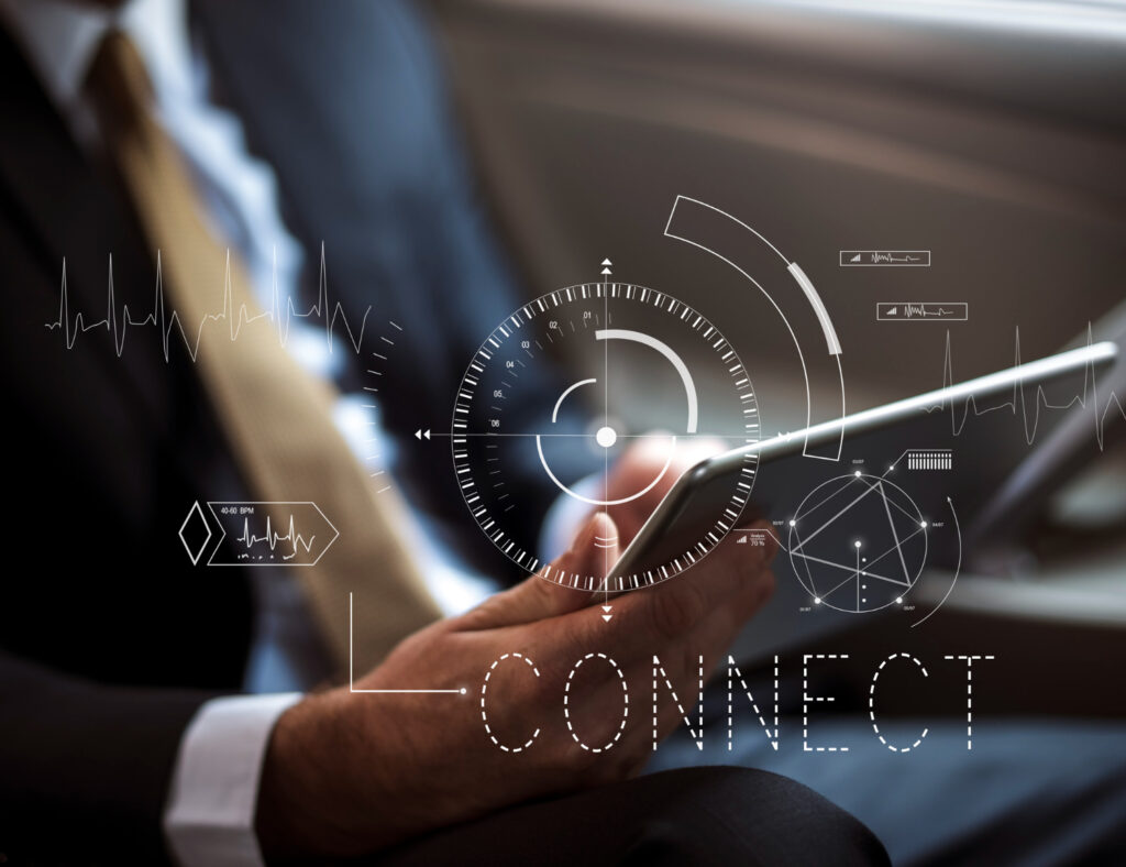 Businessperson using tablet with 'CONNECT' digital overlay