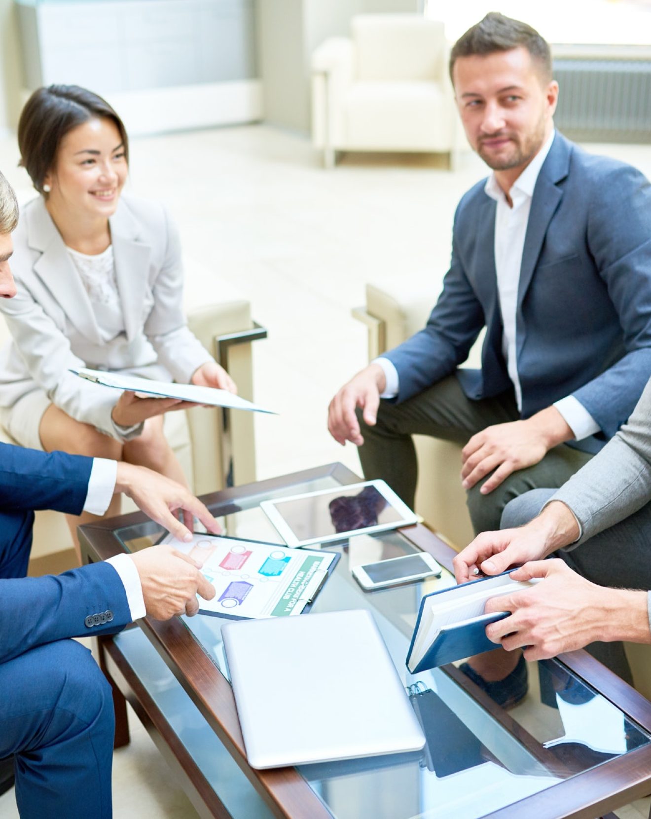 team-of-cheerful-business-people-in-meeting.jpg